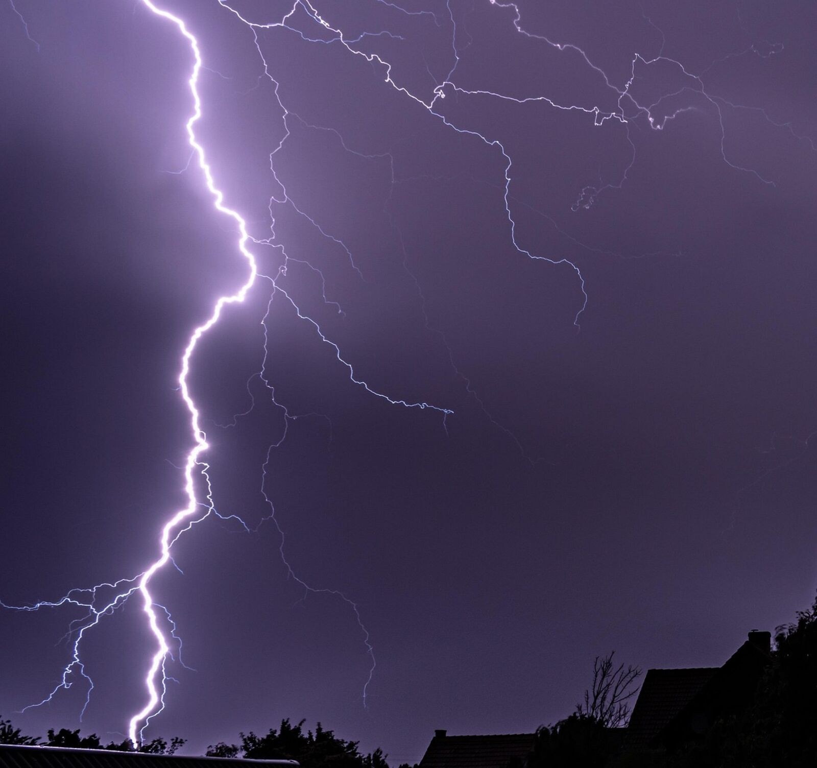 Close view of lightning above a commercial structure